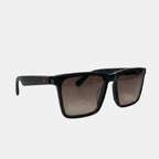 VAUCLIOR SORE ONE black square frame sunglasses with gradient brown lenses and red stripe detail on the arm.