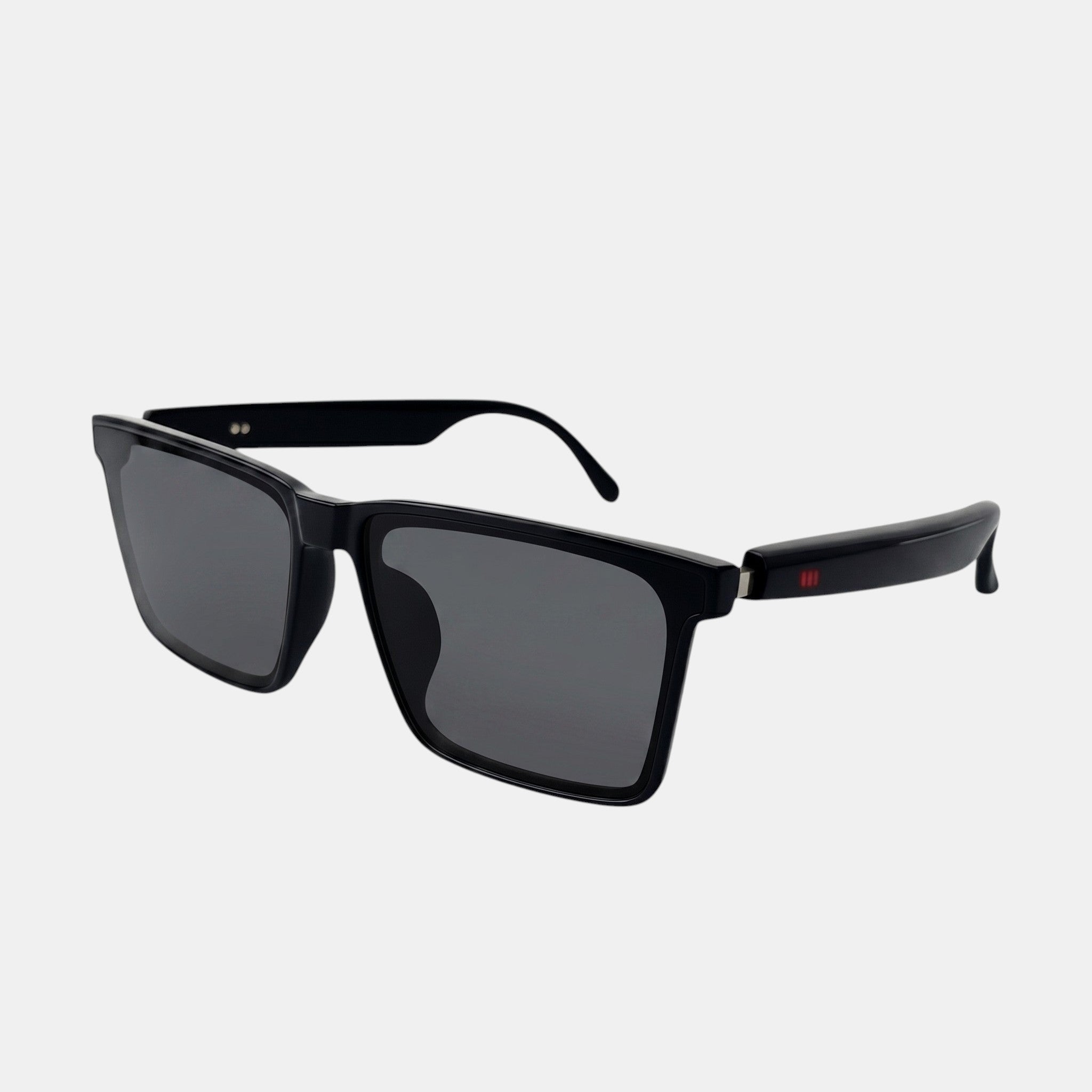 VAUCLIOR SORE ONE black rectangular sunglasses with dark grey lenses and red accent detail on the arms.