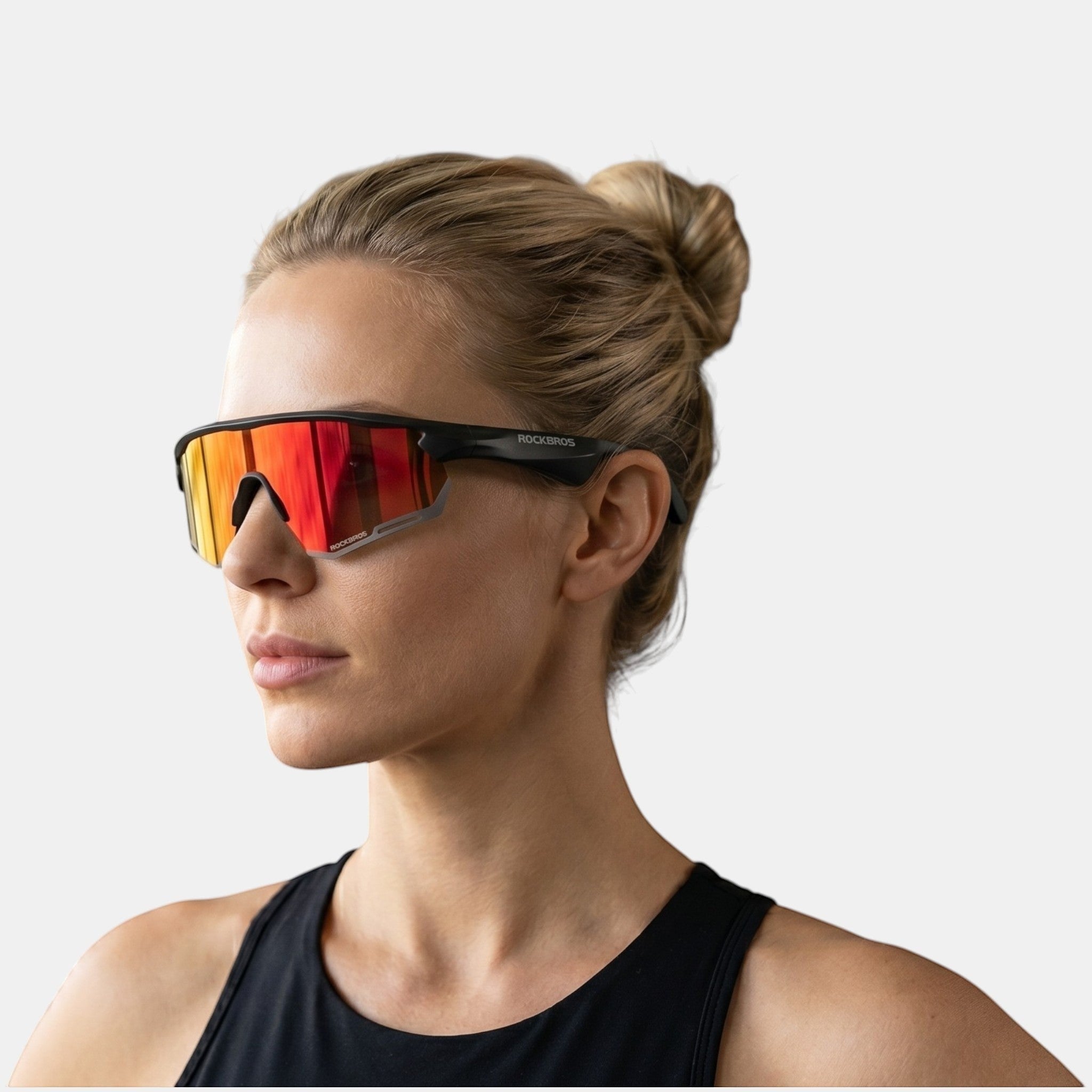 VAUCLIOR unisex black sports sunglasses with red-orange mirrored lenses, featuring ROCKBROS branding.