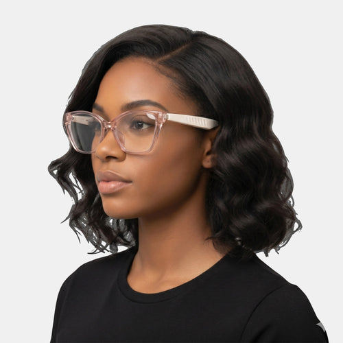 VAUCLIOR VC CLÉO smart glasses with translucent pink frames and white temples worn by a woman.