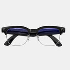 VAUCLIOR VC CORE smart glasses with black frames, silver accents, and blue-tinted lenses. Features integrated camera and indicator light.