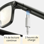 VAUCLIOR VC NOVA G1 black smart glasses with charging cable connected, offering 7 hours playback and 2 hours charging.